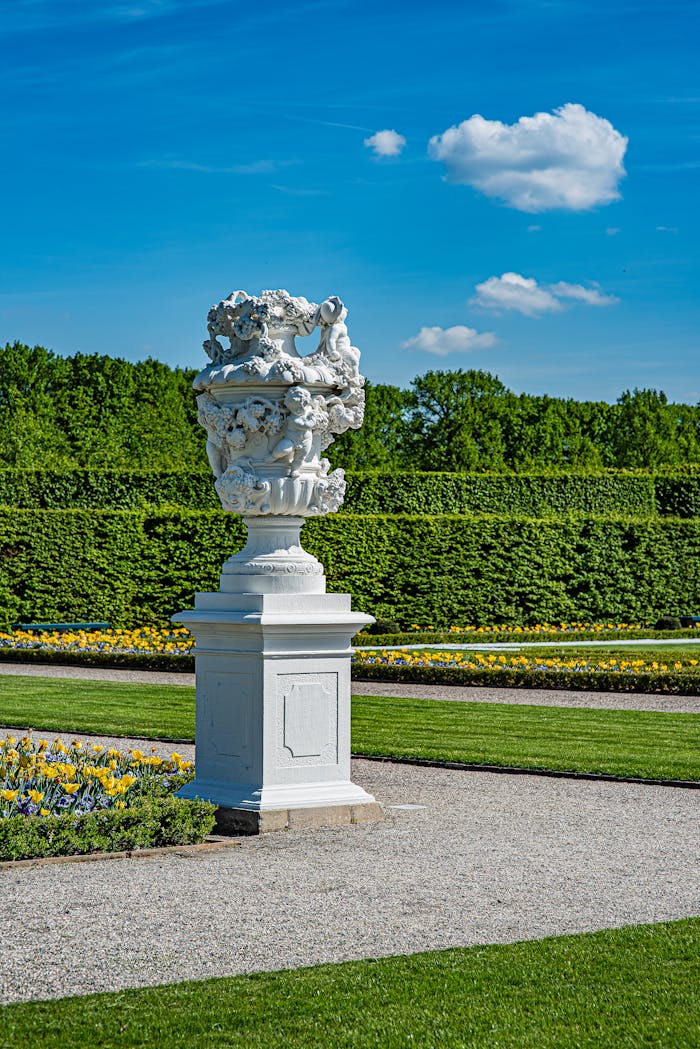services-02 Stunning marble sculpture in Hannover's Herrenhausen Gardens, capturing classic European garden design.